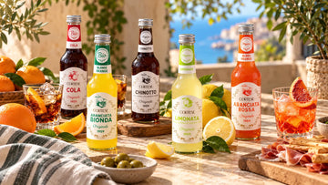 Italian citrus drinks by Cortese with citrus fruits and aperitivo snacks